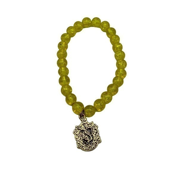 TM & WBEI (s17) Harry Potter Hufflepuff gold and yellow stretch fashion … - Picture 1 of 16